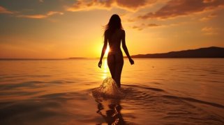 Beautiful-woman-walking-in-the-water-on-the-beach 934877-584