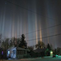 px-Light pillars over Laramie Wyoming in winter night