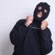 Man-with-black-mask-outfit-suspect-robbery-wearing-handcuffs