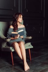 Beautiful-woman-sitting-chair-reading-book 78492-1590