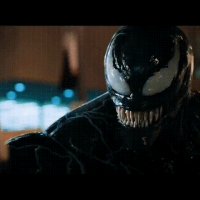 Venom licks a man