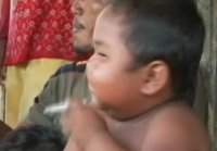 Indonesian baby on 40 cigarettes a day