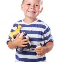 Happy-child-with-dinosaur-toys 1187-2922