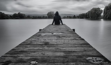 depositphotos 60959067-stock-photo-man-sit-on-wooden-pier